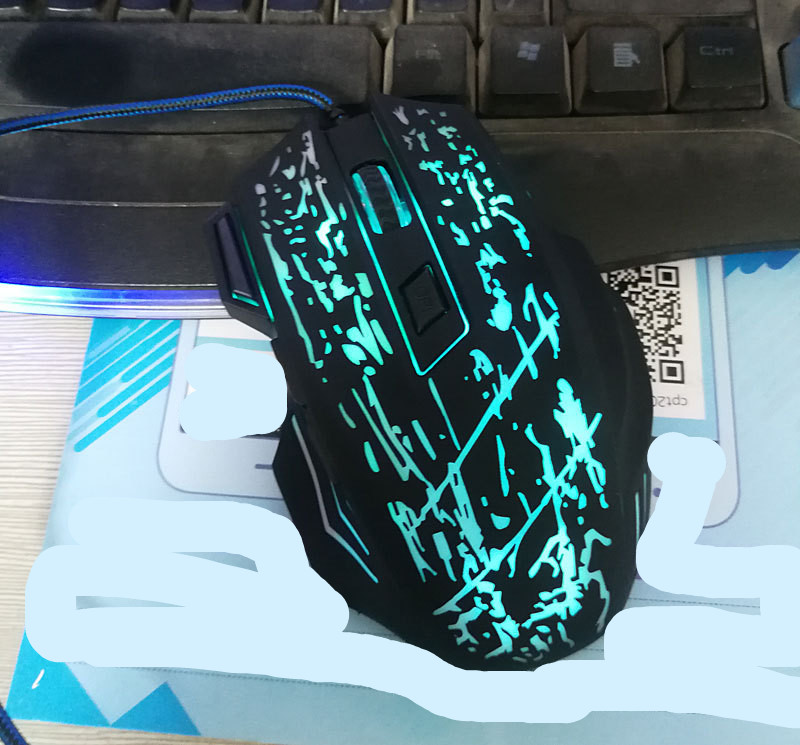 7-button Colorful Glowing USB Gaming Mouse - Crack 7 keys